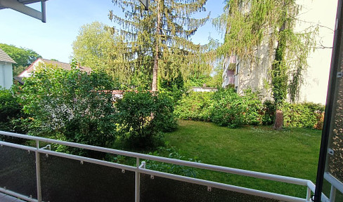 View of the greenery + space miracle, 2-room apartment, raised first floor, balcony, garage, TLB, EBK, cellar and attic compartment