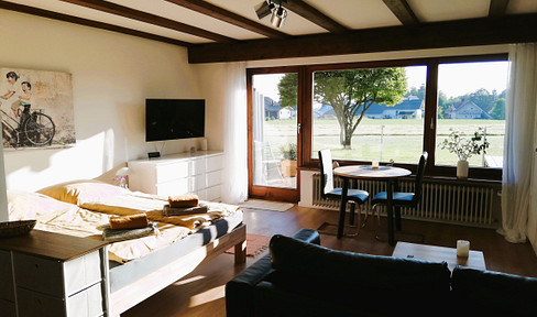 Fully equipped apartment, terrace, garden, and parking space.