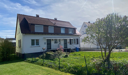 Two-family house in idyllic residential area