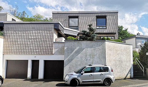 Light-flooded end terraced house with large terrace and distant views.