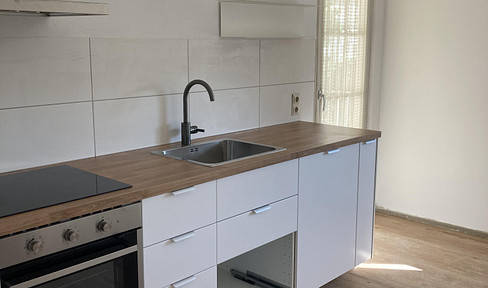 Refurbished 3-room apartment with large eat-in kitchen City center