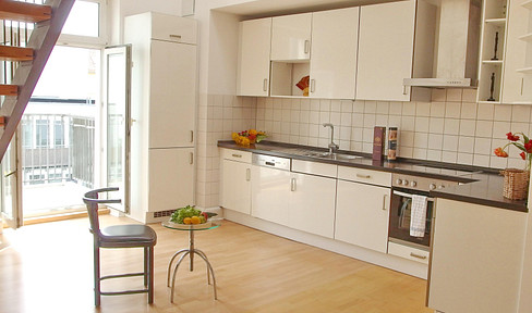 In the middle of the government district - top floor maisonette -