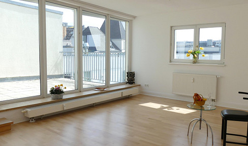 In the middle of the government district - top floor maisonette -