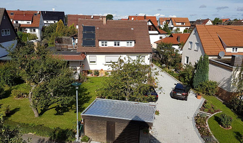 Two-family house with barn and huge garden