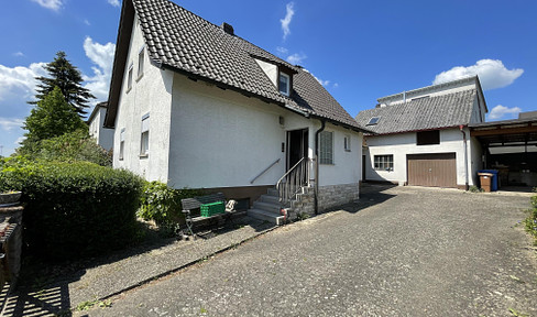 One-family house to two-family house with large garden