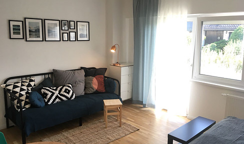 moderne Eigentumswohnung mit Terrasse + Gartenanteil im EG + Garage als Option