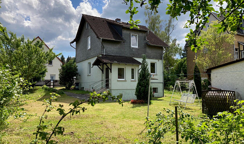 SINGLE FAMILY HOUSE with approx. 100m² living space and garden plot in a quiet location