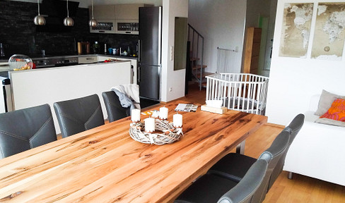 Penthouse maisonette with EKB above the rooftops of Niederrad