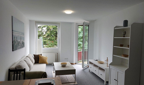 Bright, quietly located and well-designed 2-room apartment with balcony - fully furnished