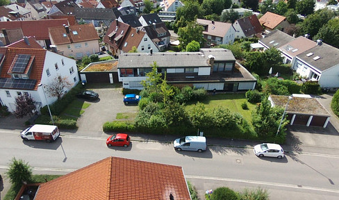 Residential and commercial building with spacious plot in the center of Kernen-Rommelshausen