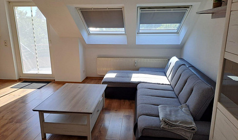 Move in carefree: Fantastic top floor apartment with balcony. Fully furnished!