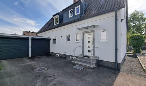 Two-family house on 438 sqm plot in Munich Allach built in 1956, extended in 1974