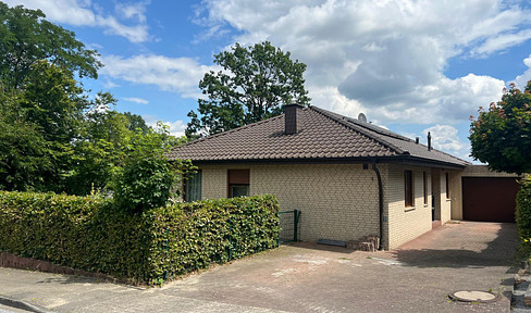 Charming corner bungalow with conservatory and garage