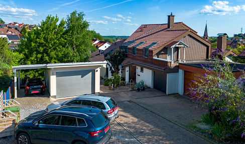 Großzügiges Einfamilienhaus (HH) mit Einliegerwohnung (NH) in ruhiger Lage