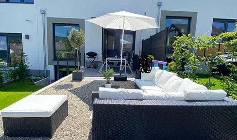 Exklusives Gartenhofhaus mit Garten, 2 Tiefgaragenstellplätzen und moderner Energietechnik