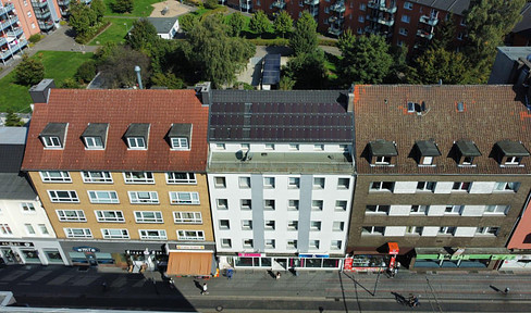 Attractive modern apartment building with commercial units and garden in Herne Wanne