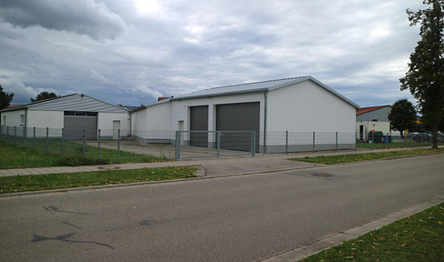 Commercial property in mixed residential area with 3 warehouses and open space