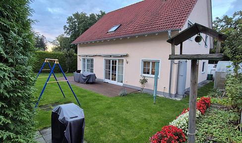 Light-flooded two-family house or detached house with granny apartment