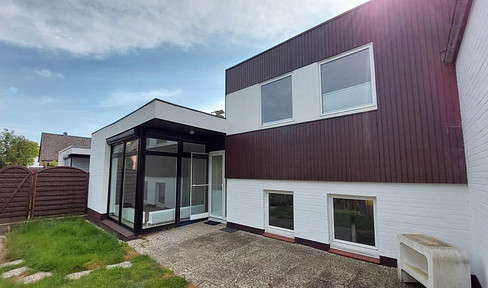 Modern terraced house with garage