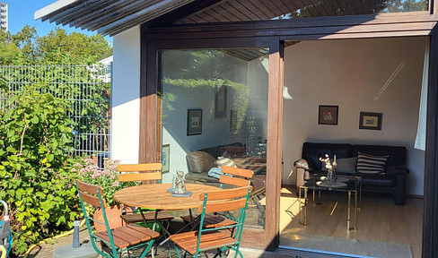 Small mid-terraced house in the countryside with garage