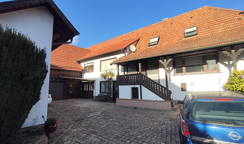 Two-family house with barn, workshop and two vaulted cellars