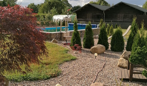 Detached house with granny apartment, outbuilding and pool near the Baltic Sea