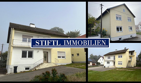 Zwei-Familien-Haus mit großem Grundstück und Lagerhalle