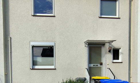 End terraced house with garage