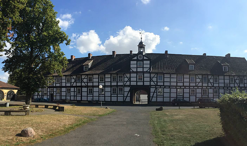 6 apartment buildings with 44 garages and 8 parking spaces