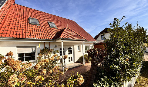 House with plot and carport