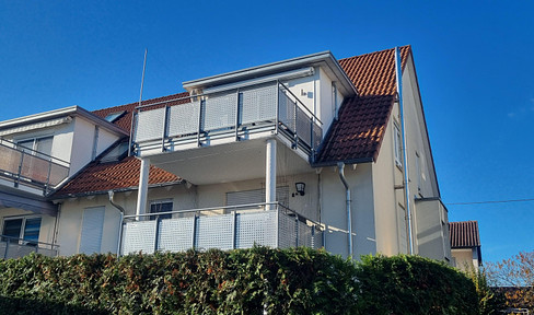 Light-flooded maisonette apartment with balcony, garage and parking space