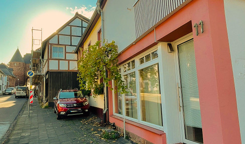 Charming, light-flooded 3-room apartment with roof terrace in the heart of Nideggen