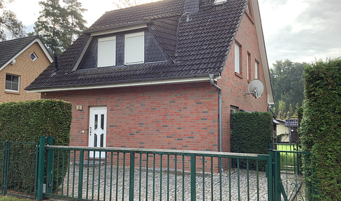 Large detached house with low-maintenance garden and outbuildings