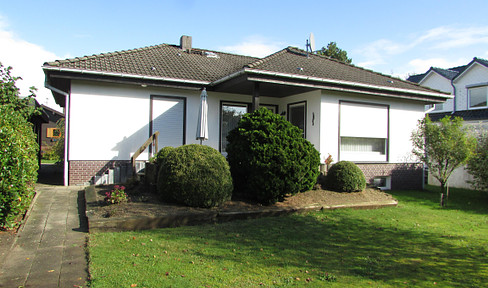 Prefabricated angled bungalow with converted basement