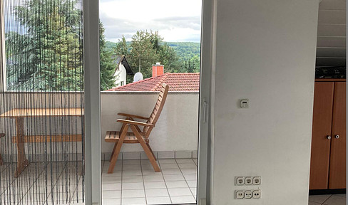 Bright & well-designed 3-room attic apartment with balcony and fitted kitchen in Lahnau