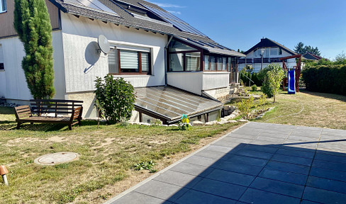 Familienfreundliches Haus mit großem Garten in ruhiger Lage