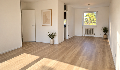 Spacious 3-room apartment with fitted kitchen, balcony and distant view