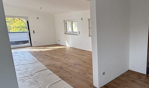 Exclusive new-build penthouse in Bad Aibling's prime location with views of the countryside