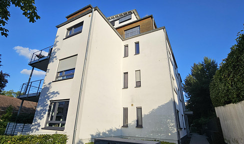 Attractive apartment near the Rhine incl. underground parking space + e-charging station without estate agent