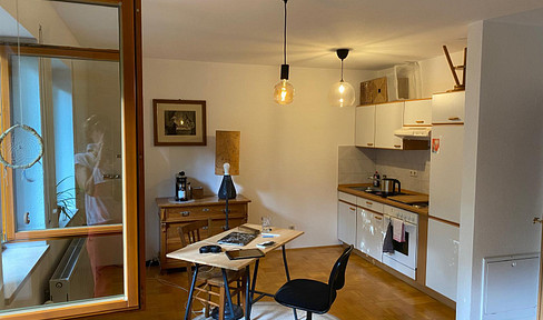 Quiet 1-bedroom apartment with a large, private terrace and parking space.