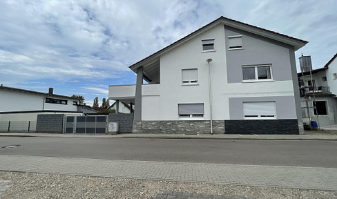 Charming 2-family house in a central location in Oberachern - Versatile usage options!