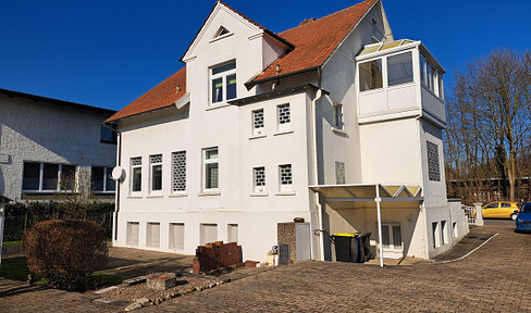 Venerable bathhouse with potential and a small building site