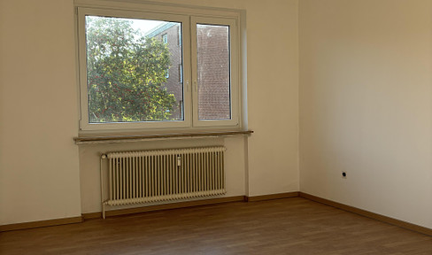 Zentrale 3-Zimmer-Wohnung mit Einbauküche, Balkon und Tiefgarage