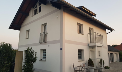 Two-family house in Ruhstorf (1st + 2nd floor for immediate use; ground floor rented)