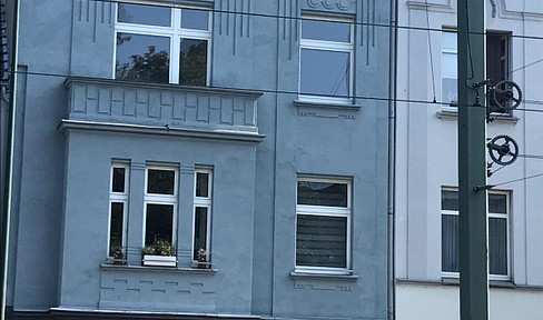 Attractive apartment building with store in Düsseldorf-Holthausen