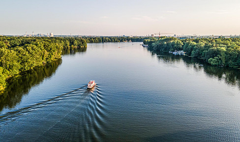 Dachgeschossneubau mit Wasserblick - Potenzial zu verkaufen!