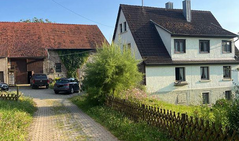 Farmstead with residential house on the quiet outskirts of the village