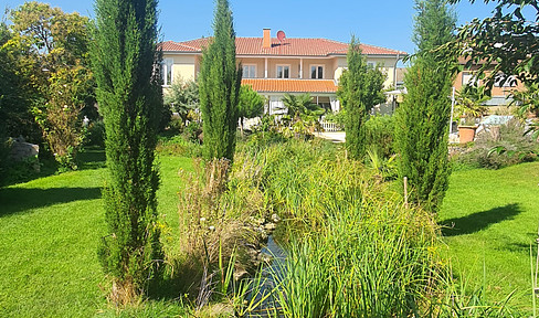 Unique in Mediterranean style: Spacious villa with potential just outside Cologne