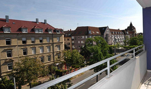 Eine schöne und zentral gelegene 1-Zi-Wohnung mit Balkon und Einbauküche