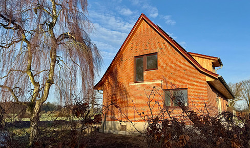 Upper floor apartment on the edge of a field